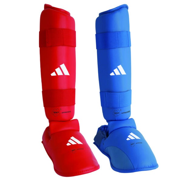 Adidas WKF Approved removable karate shin and instep guards in blue and red with adjustable hook-and-loop straps for karate competition and training.