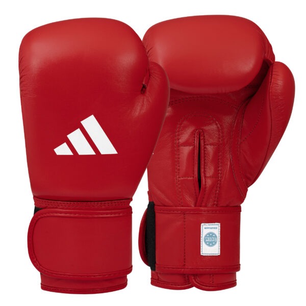 Front and palm view of the Adidas WAKO Competition boxing gloves in red with hook-and-loop wrist closure, attached thumb, and WAKO approved label.