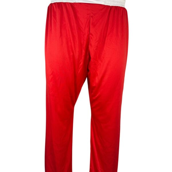 Front view of the Adidas WAKO Full Contact kickboxing pants in red with a white elastic waistband and Adidas logo.