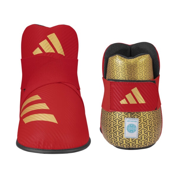 Front and rear view of the Adidas WAKO Kickboxing Safety Shoes Pro in red and gold with elastic strap fastening and WAKO approved label.
