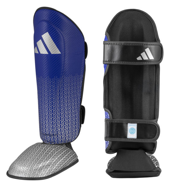 Front and inner view of the Adidas WAKO shin guards with removable in-step protection in blue featuring hook-and-loop straps, cushioned lining, and WAKO approved label.